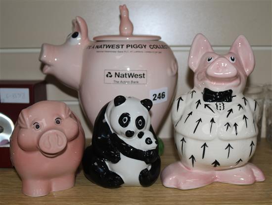 Four NatWest money boxes